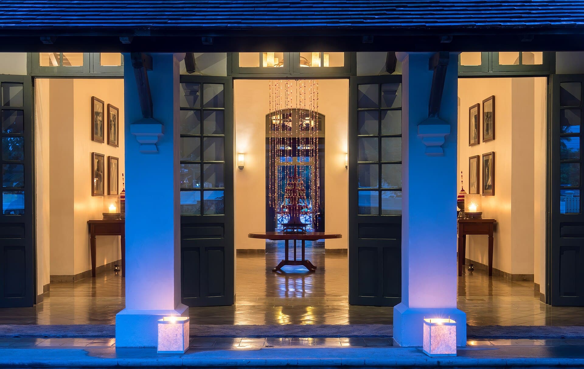 Hotel entrance lobby glowing at blue hour