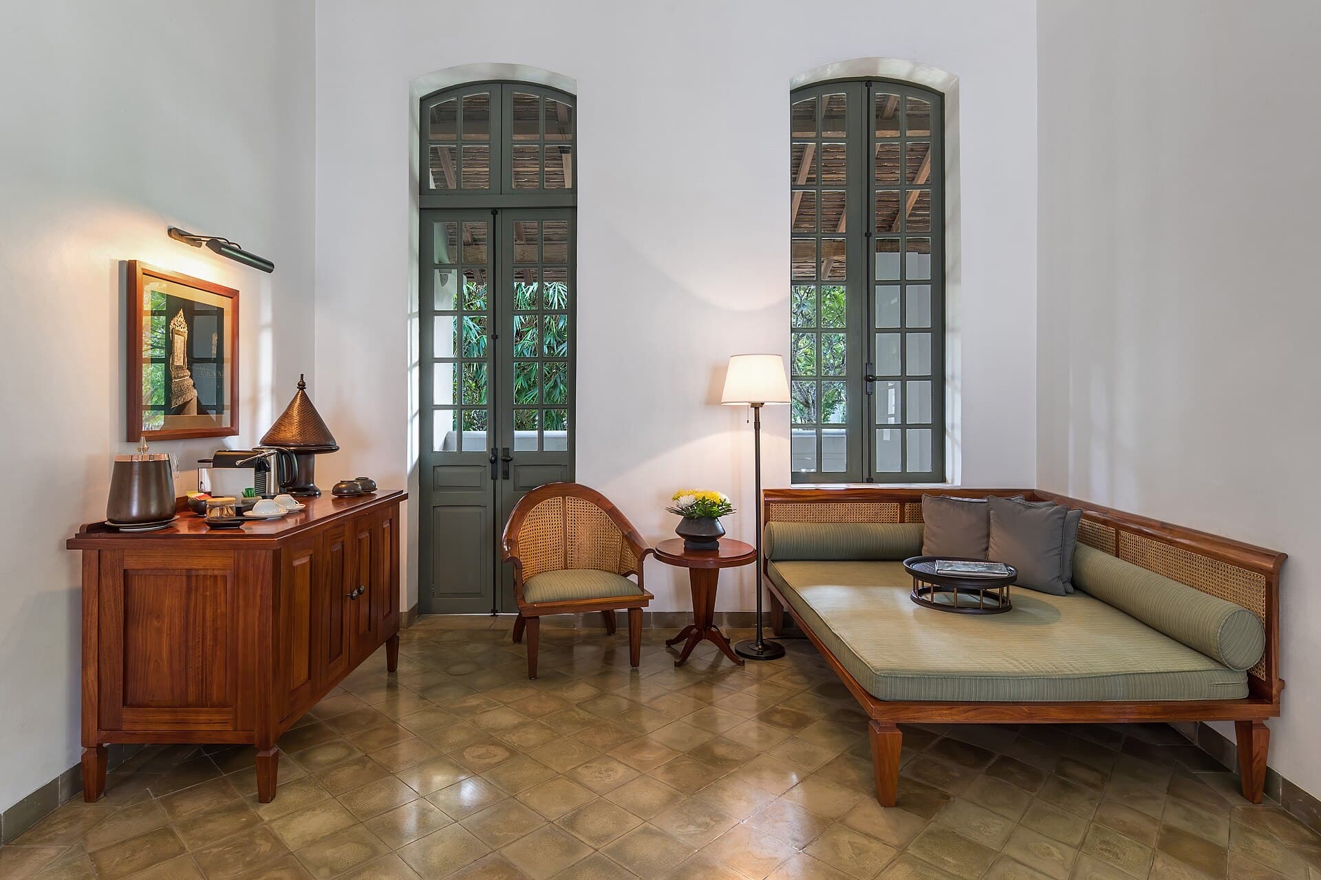 Elegant hotel lobby lounge with warm lighting and columns