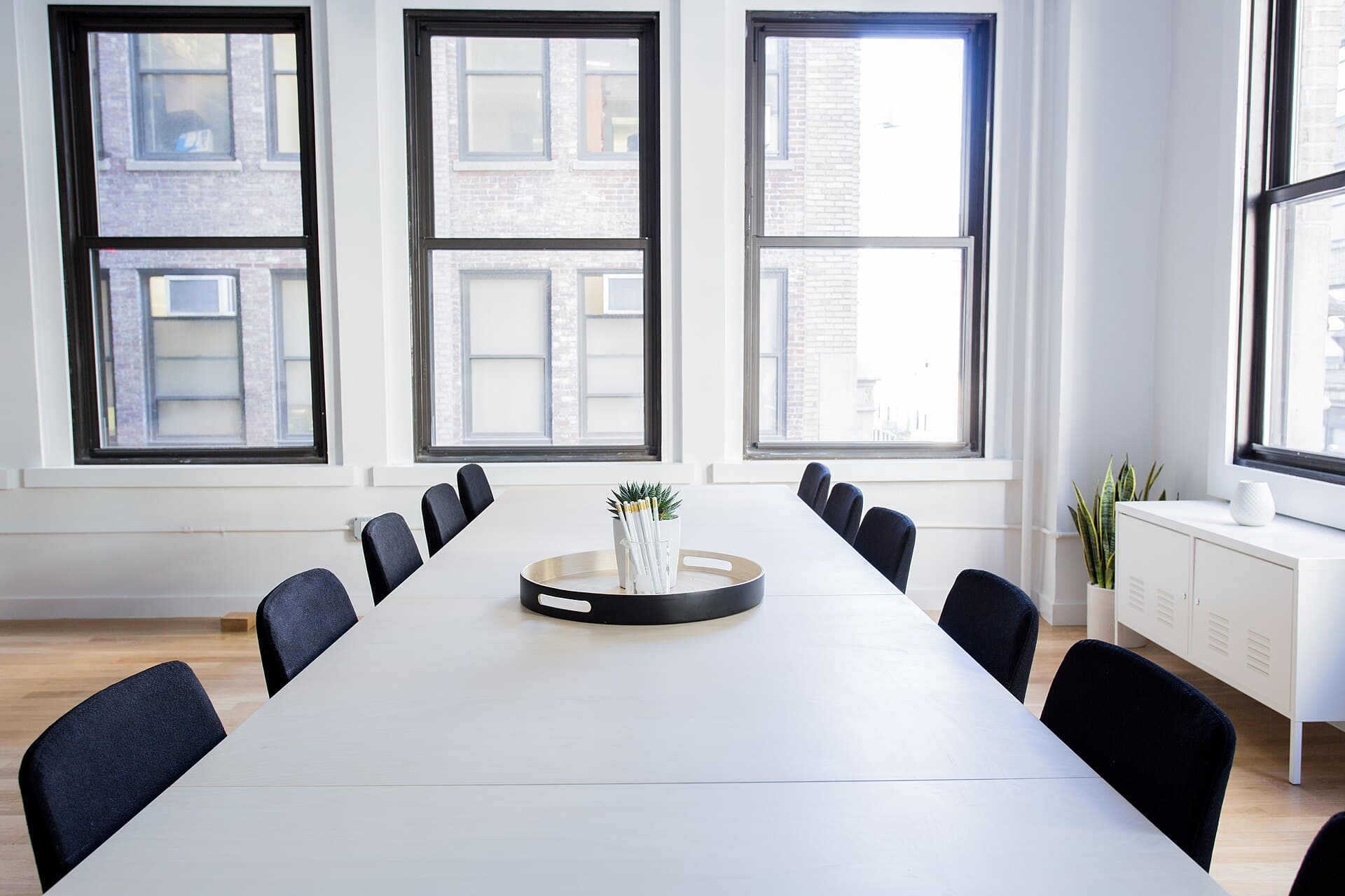 Long conference table set for a group meeting