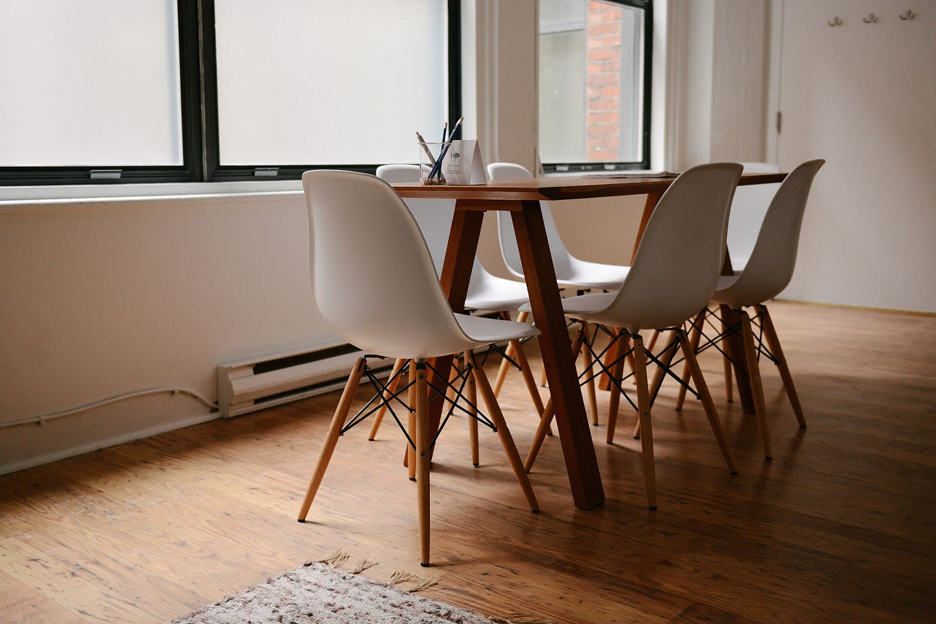 Bright, minimalist meeting room with modern chairs