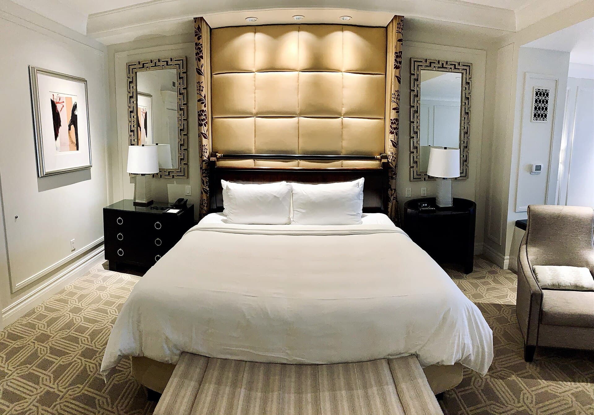 Modern hotel guest room with a king bed